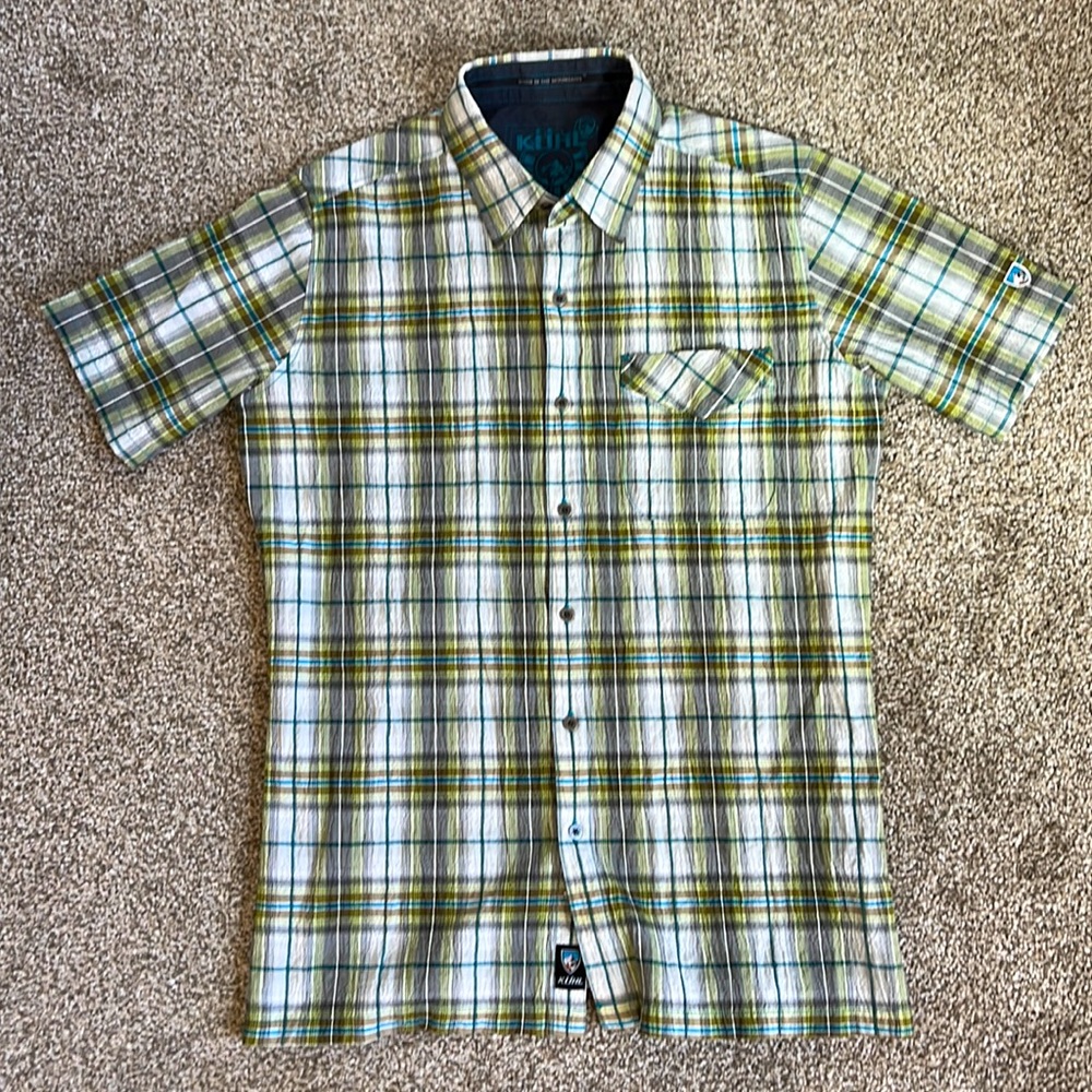 Kuhl button up short sleeve shirt. Green plaid. Size small. Like new.